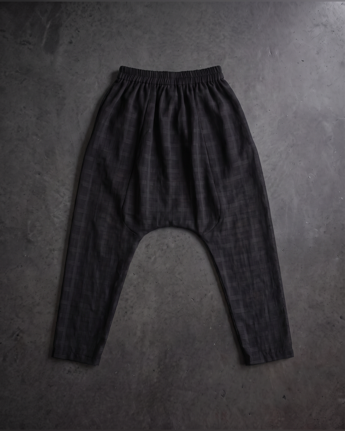 Charcoal plaid drop crotch harem trousers, flat lay