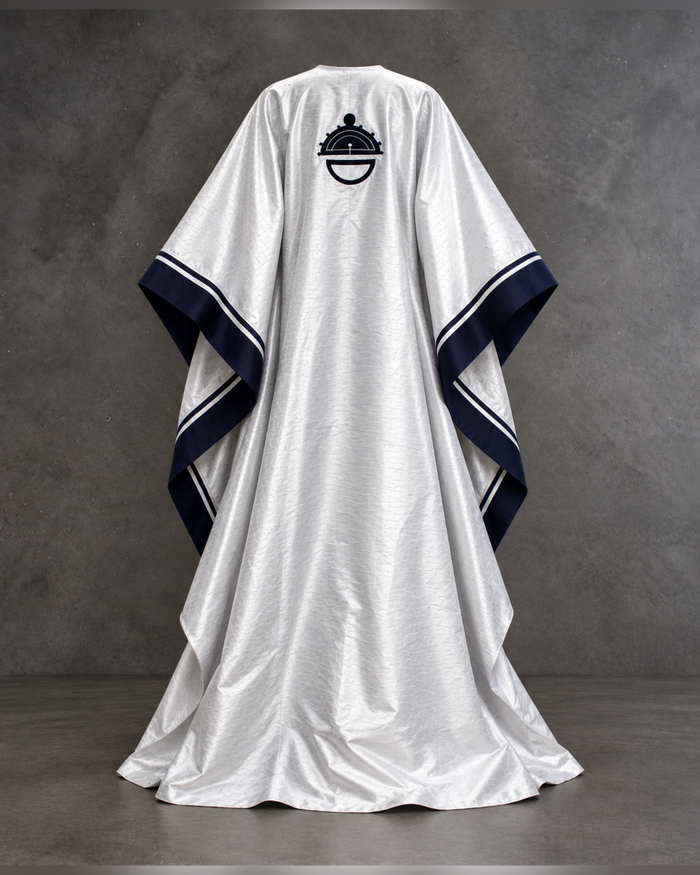 Plateau Silver shantung silk boubou, back view with the embroidered MWAMI crest