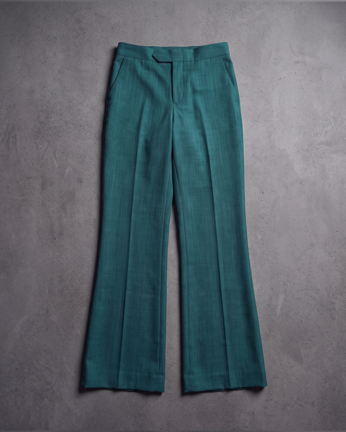 Emerald dress trousers with a full, flared leg, flat lay