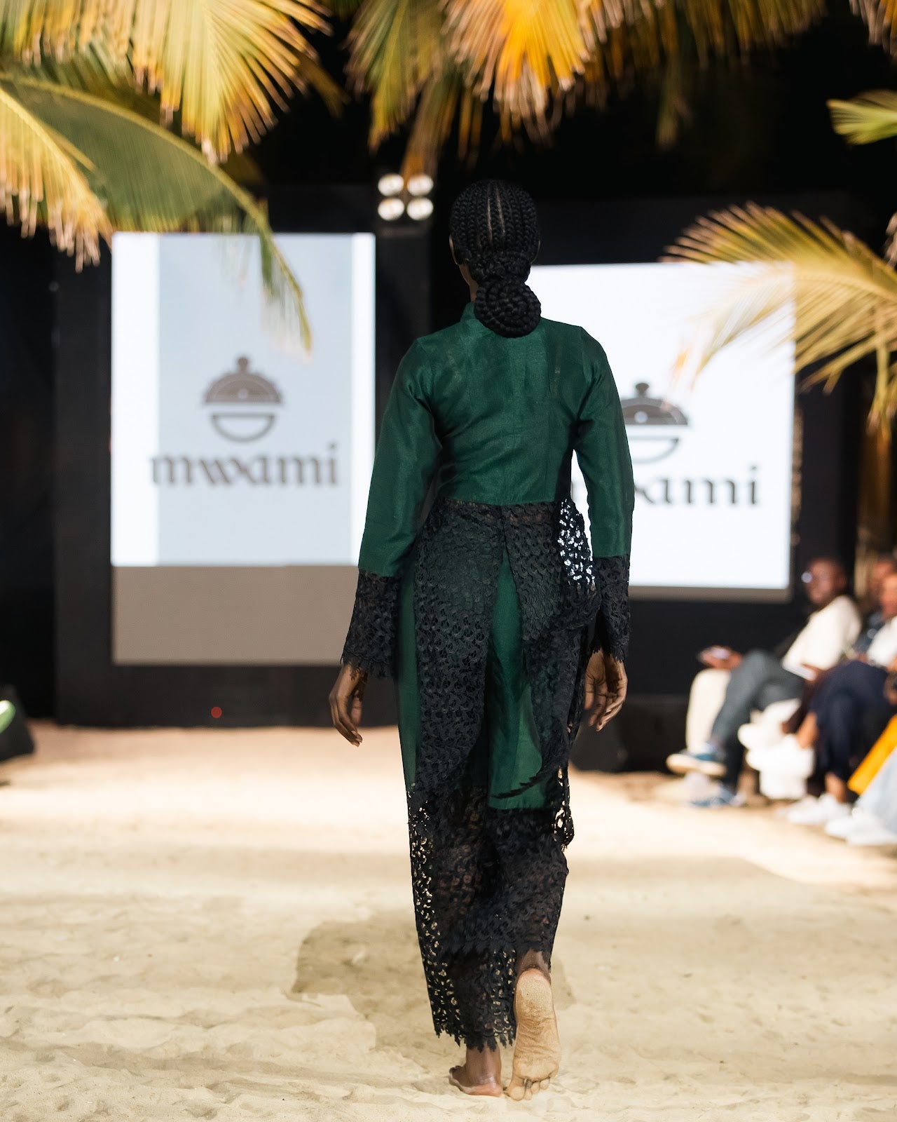 Back view of the emerald shantung silk and lace set on the Harmattan '25 runway