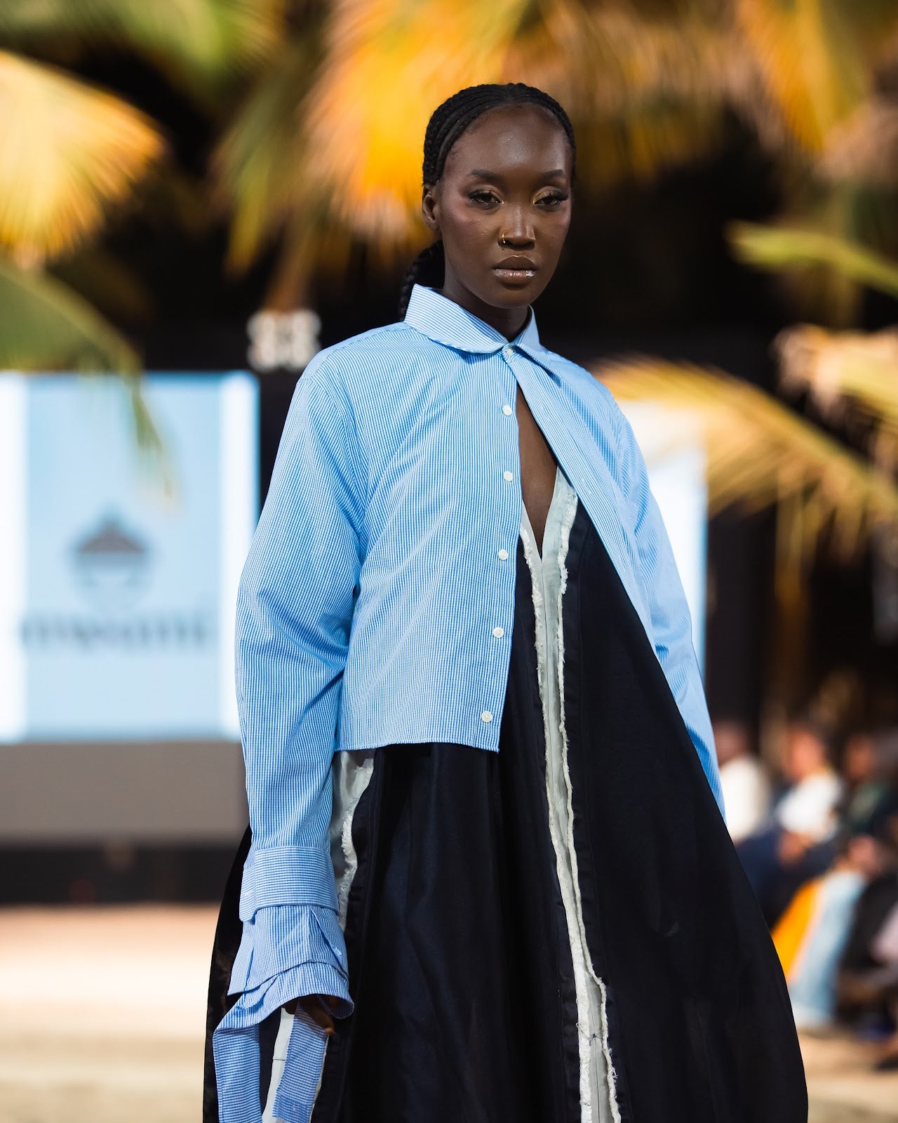 Cropped pinstripe shirt on the MWAMI Harmattan '25 runway