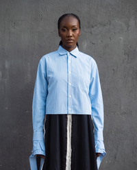MWAMI Harmattan '25 cropped pinstripe shirt worn over the Plateau Silver shantung boubou, studio