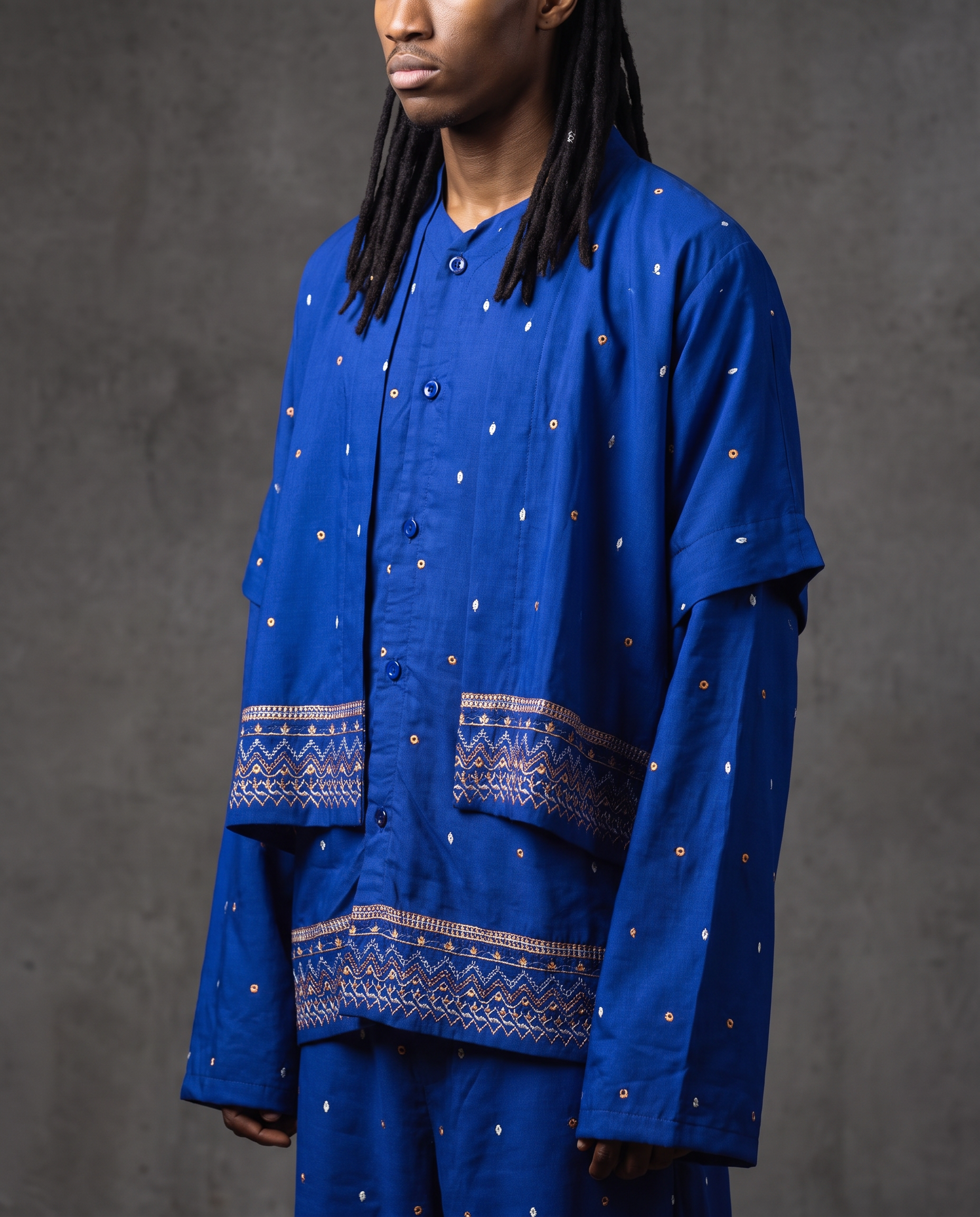 Short sleeve shirt layered over long sleeve overshirt, cobalt with copper and white embroidered dots