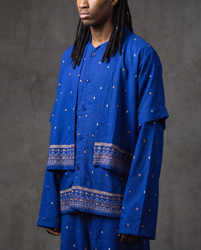 Short sleeve shirt layered over long sleeve overshirt, cobalt with copper and white embroidered dots